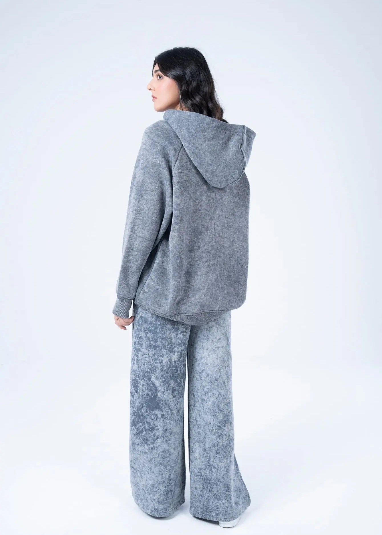 Men's charcoal fleece pull-on trousers, back view, wide legs with elastic hem