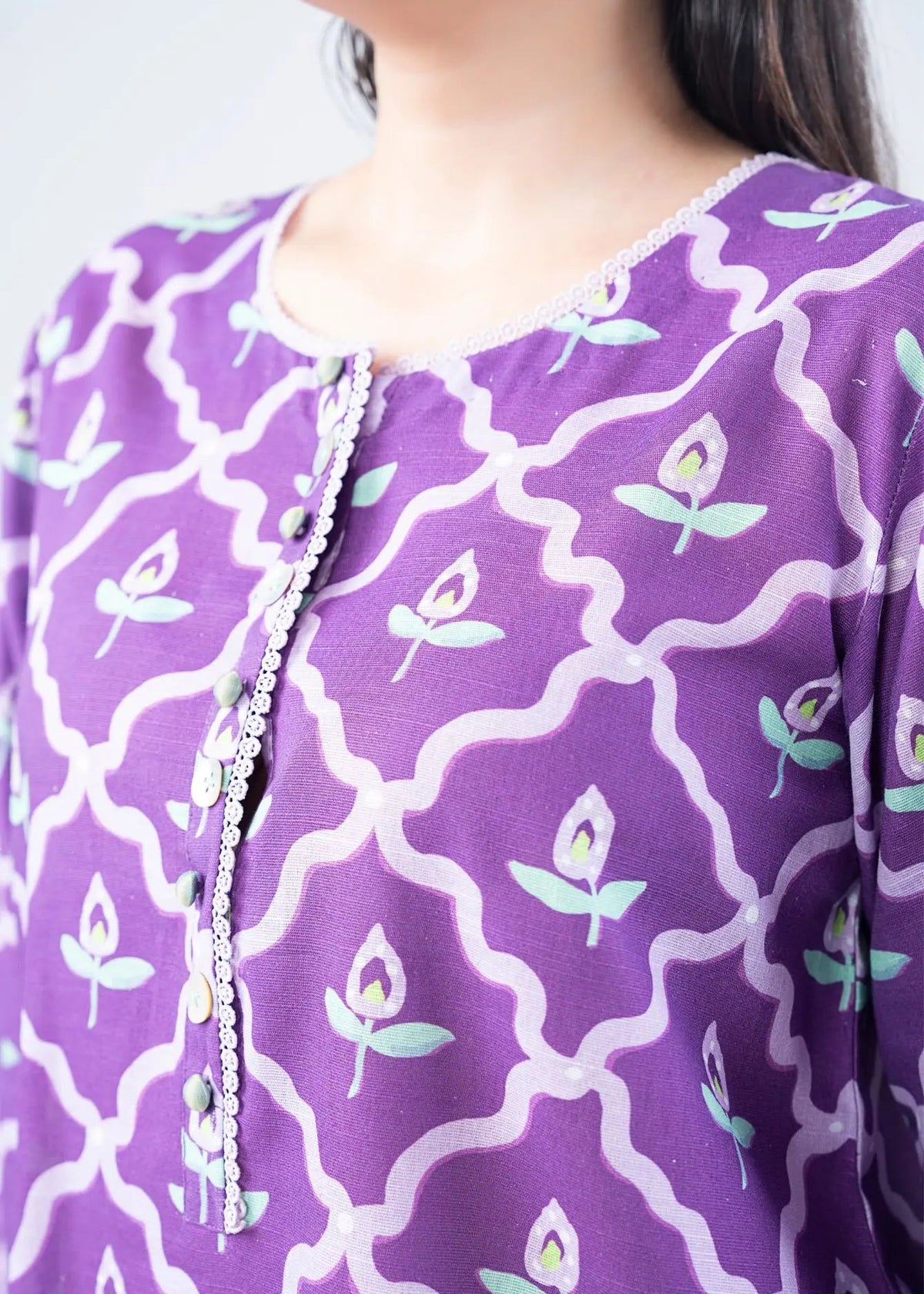 Women’s purple printed kurta neckline with button placket and tassel trim