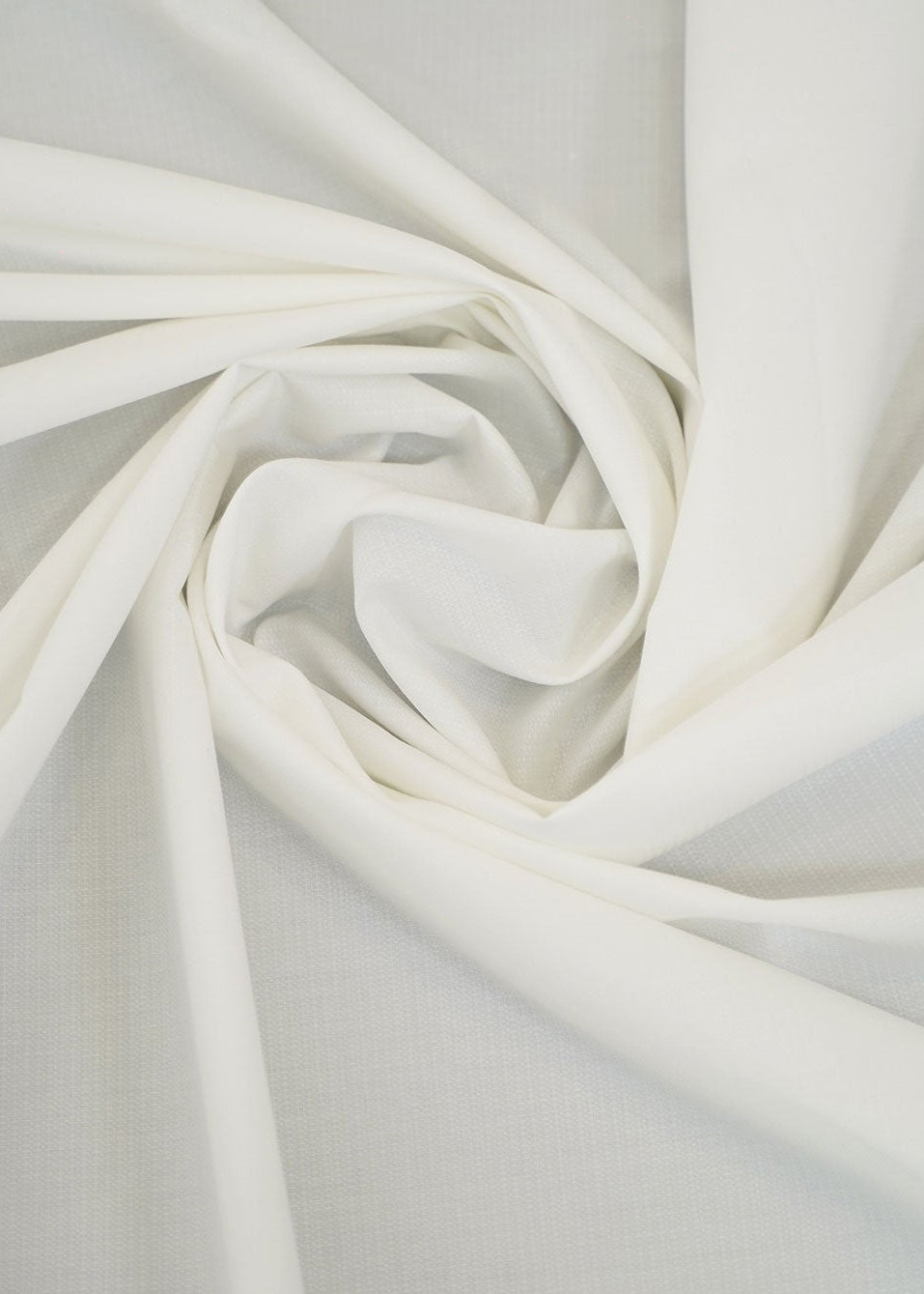 Off-white dobby fabric with woven texture, folded in soft folds