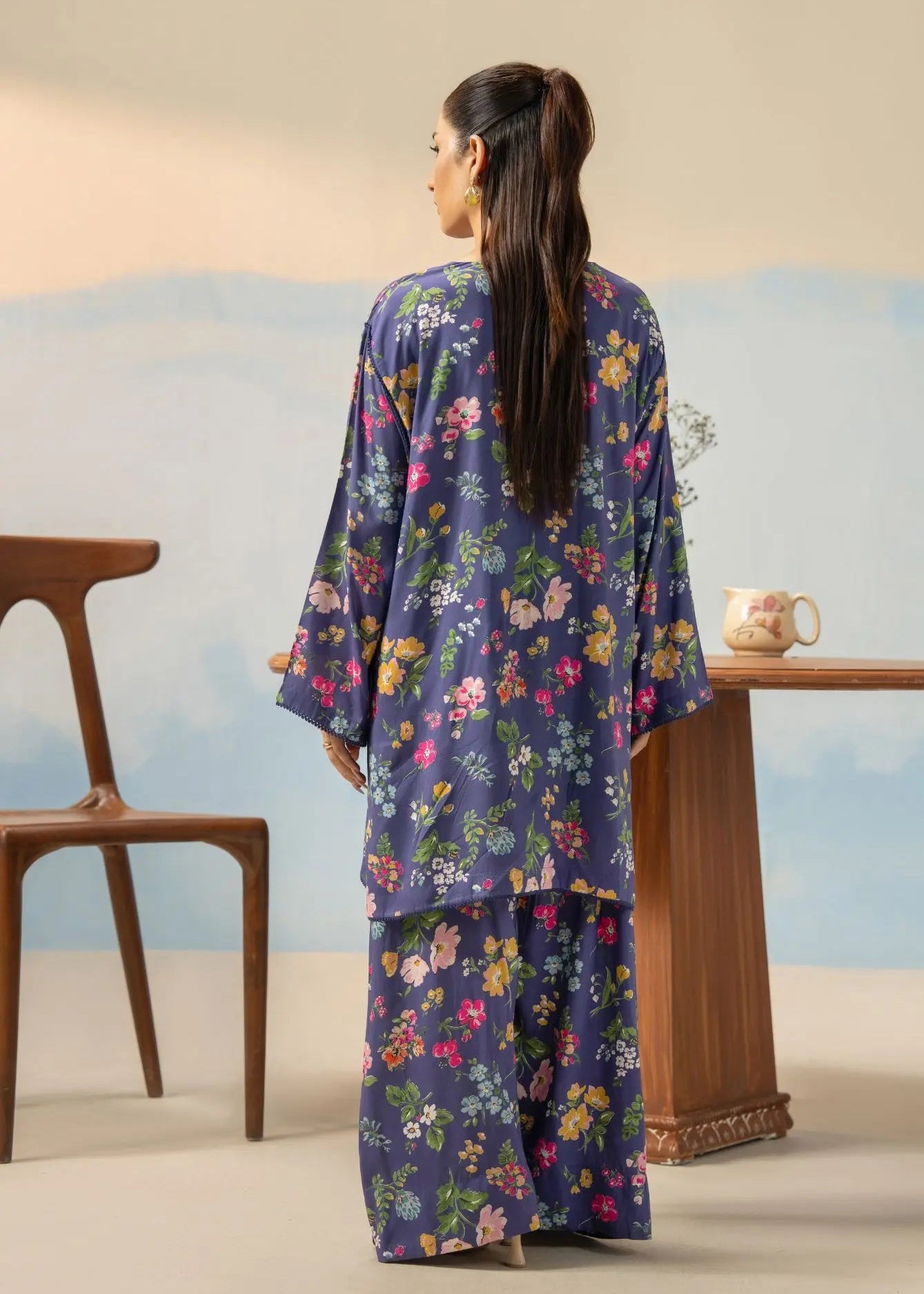 Women’s dark purple floral printed 2-piece set, back view with long top and matching long skirt