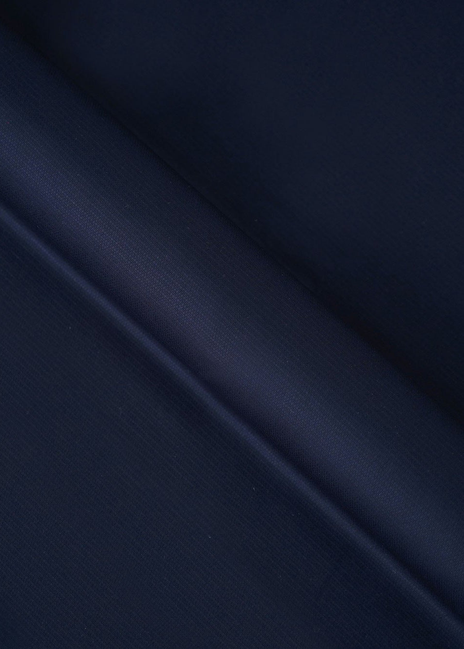 Deep navy dobby fabric with fine woven pattern, close-up texture
