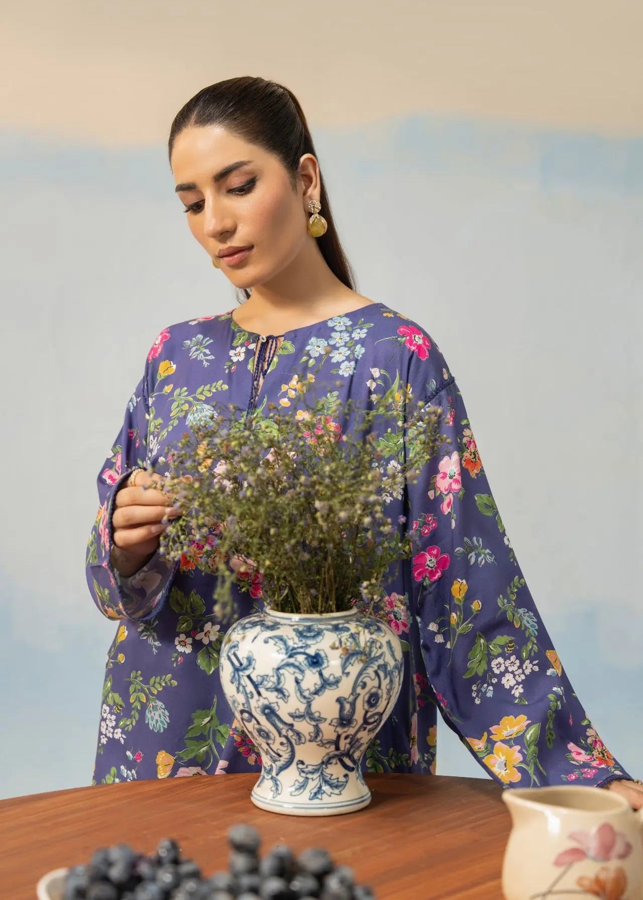 Women’s dark purple floral printed kurta top from the winter 2-piece set, round neckline with tie