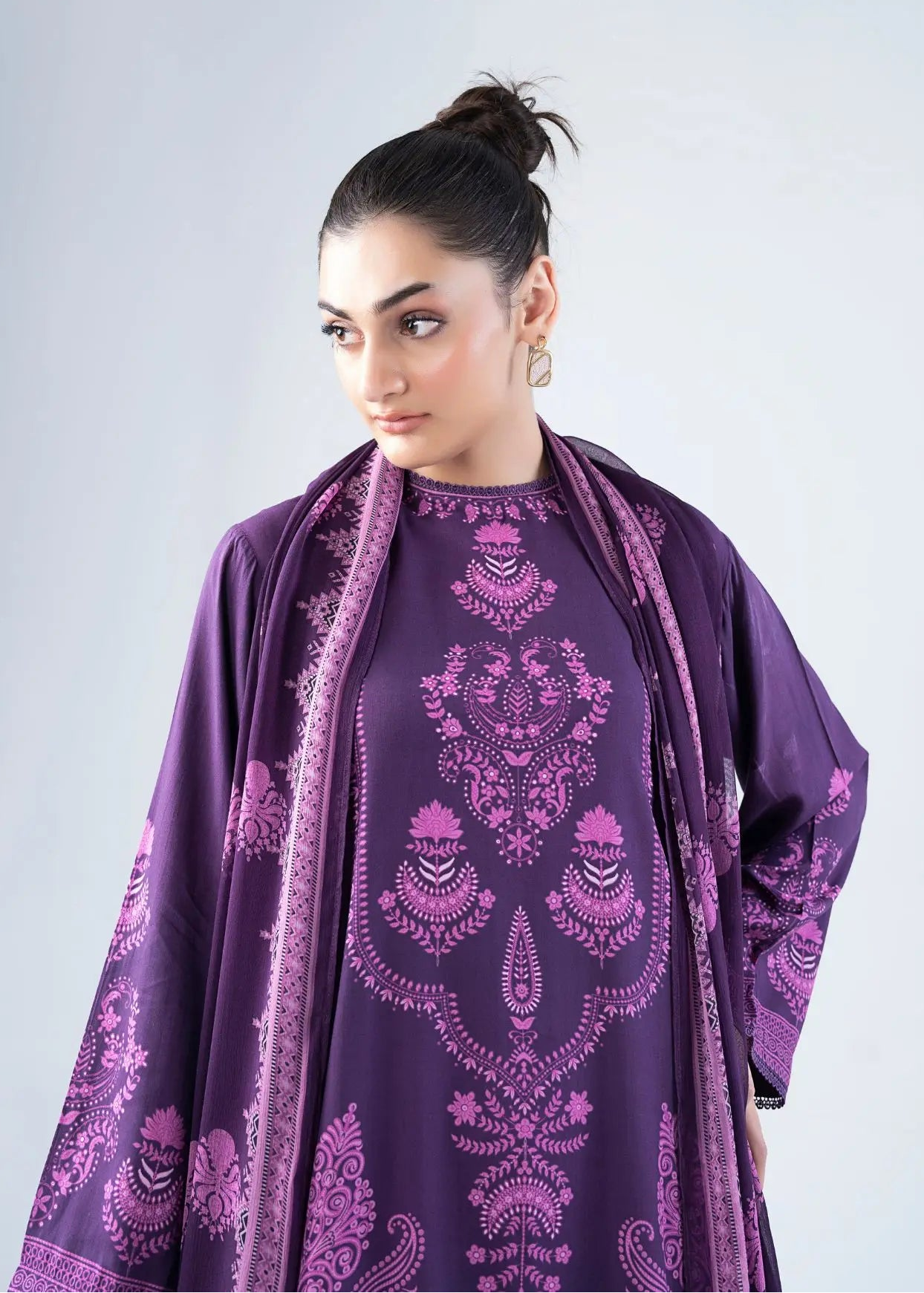 Women's purple printed tunic and dupatta detail with ornate floral paisley pattern