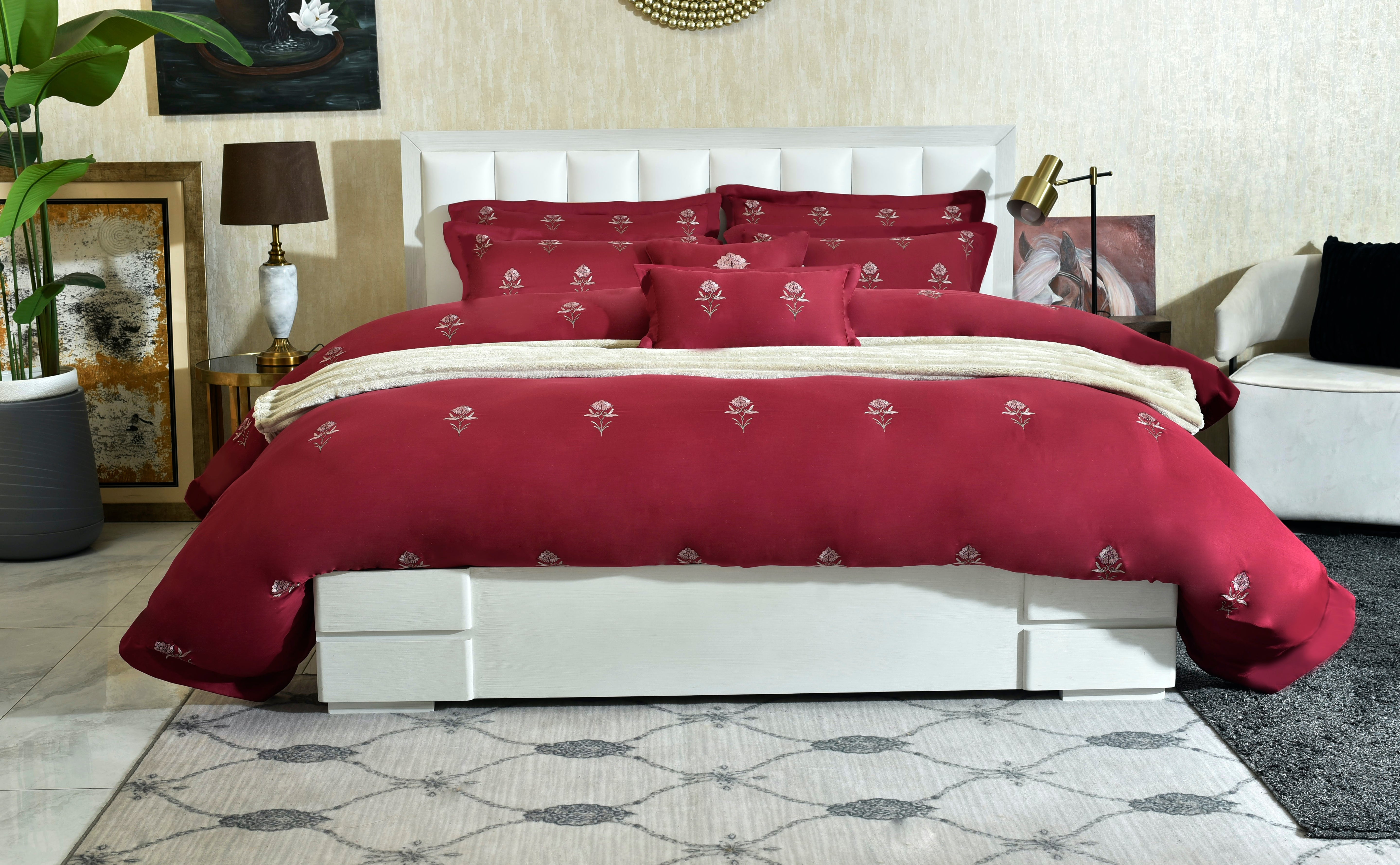 Red floral bedding set with comforter and matching pillowcases