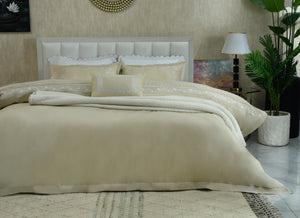 Sand duvet cover set with quilted duvet and embroidered pillow shams