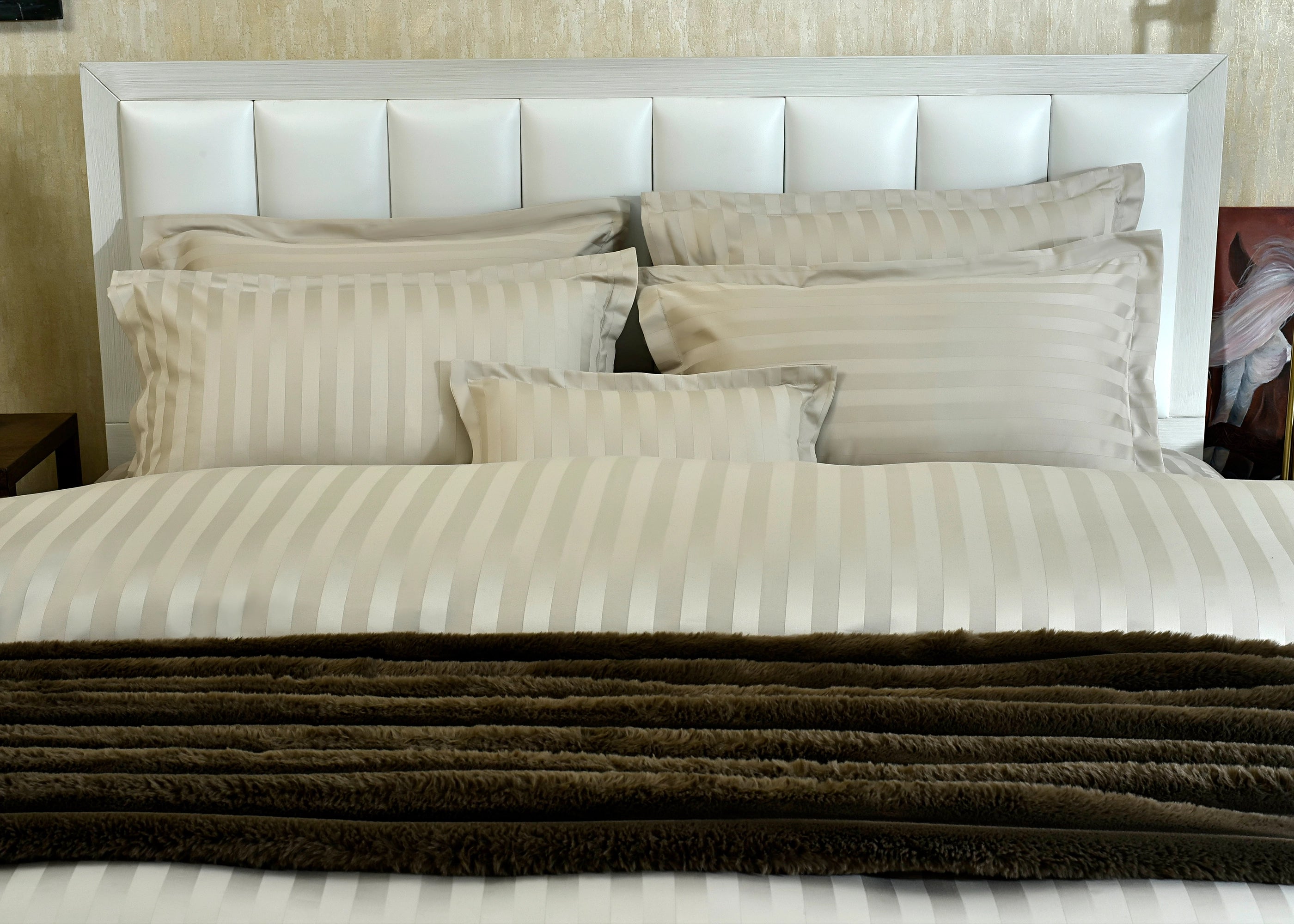 7-piece duvet cover set with light striped duvet and five coordinating pillow shams