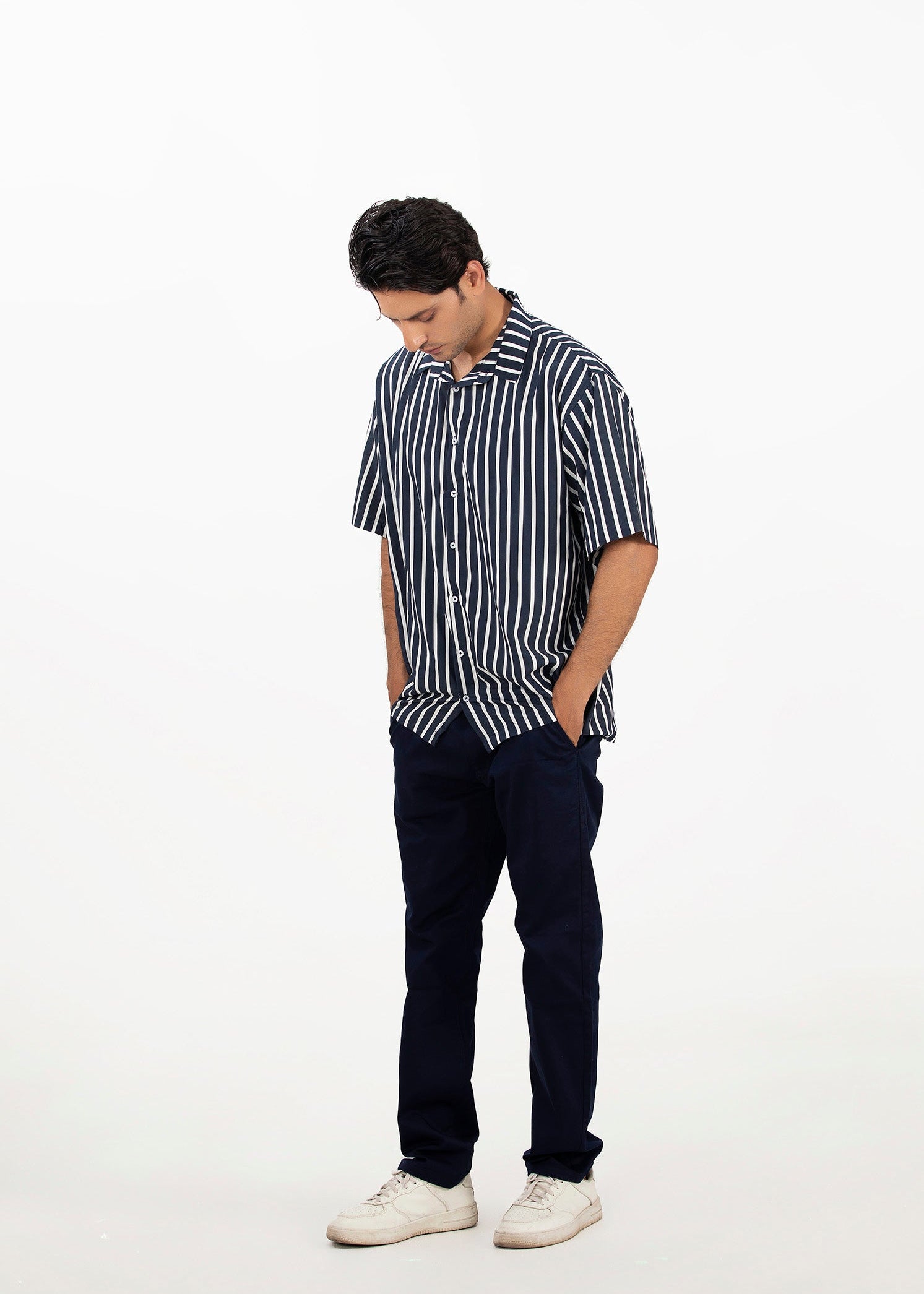 Men's striped short-sleeve button-up shirt with dark vertical stripes, camp collar