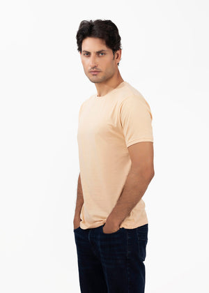 Men's peach round-neck T-shirt with short sleeves, side profile