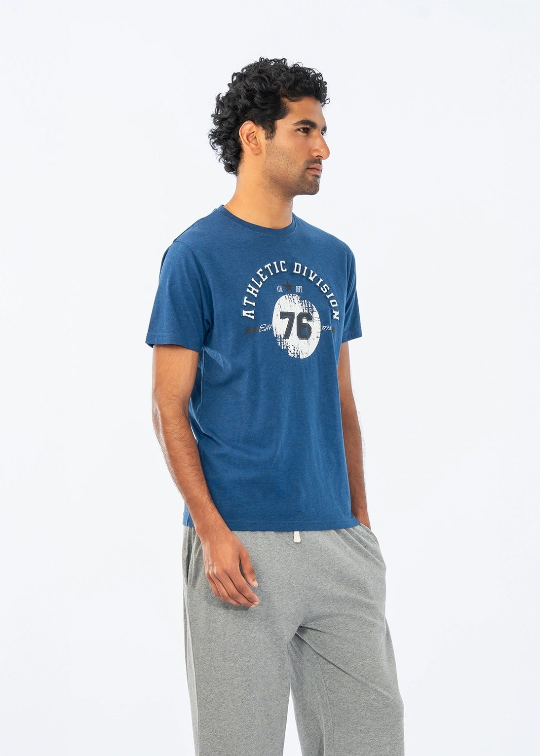 Men's blue crew-neck T-shirt with 76 graphic, side view