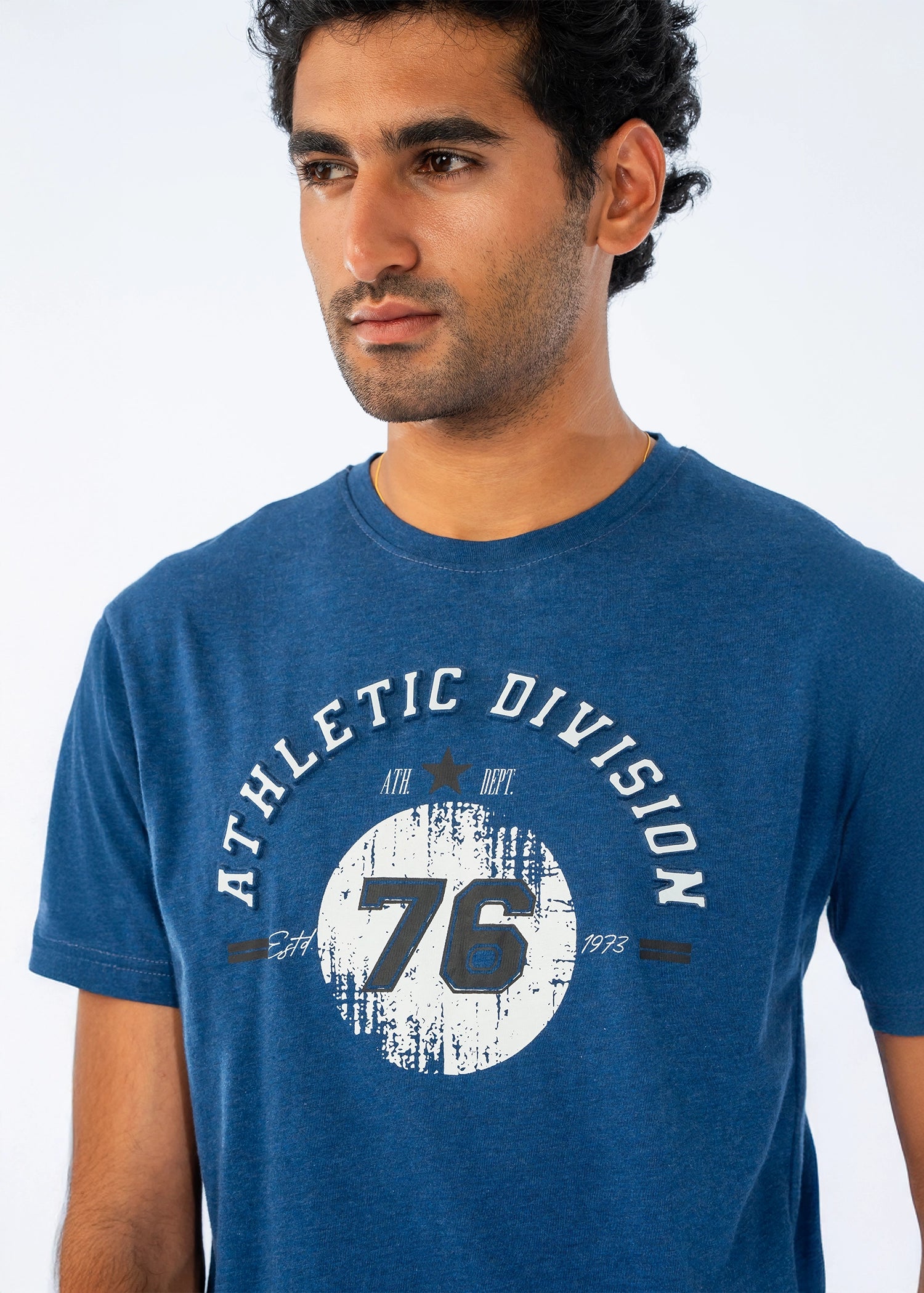Men's blue crew-neck T-shirt close-up of Athletic Division 76 graphic