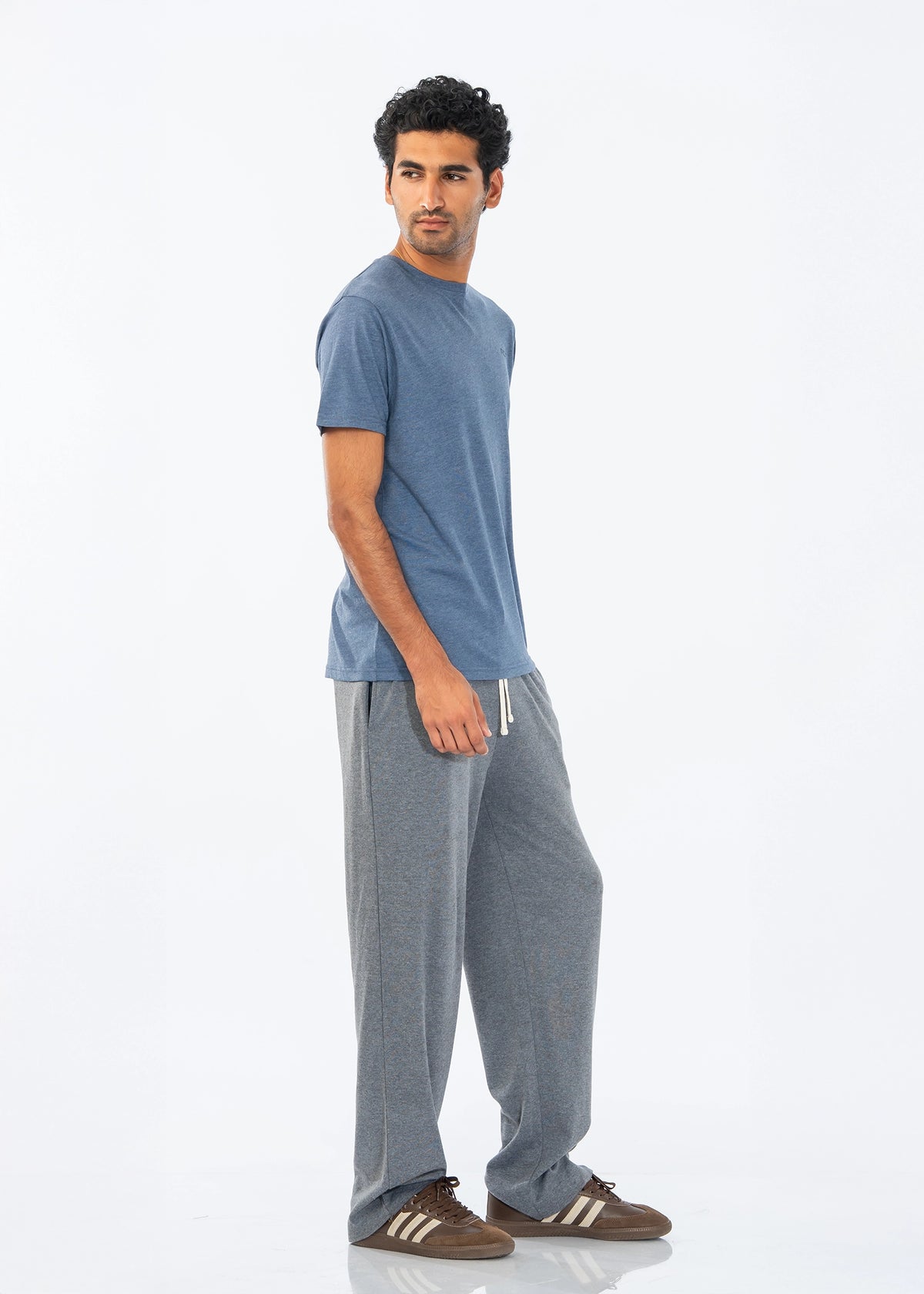 Men's charcoal grey knitted pull-on trousers, loose fit with side profile