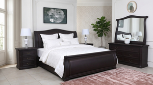 Vista dark dresser with arched mirror and six drawers, flanked by lamps