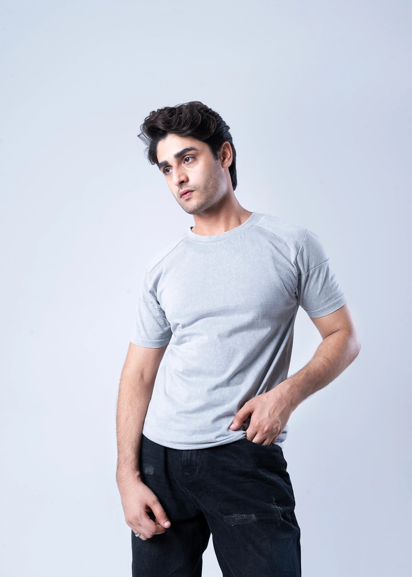 Men's light grey crew-neck t-shirt, angled front view with short sleeves