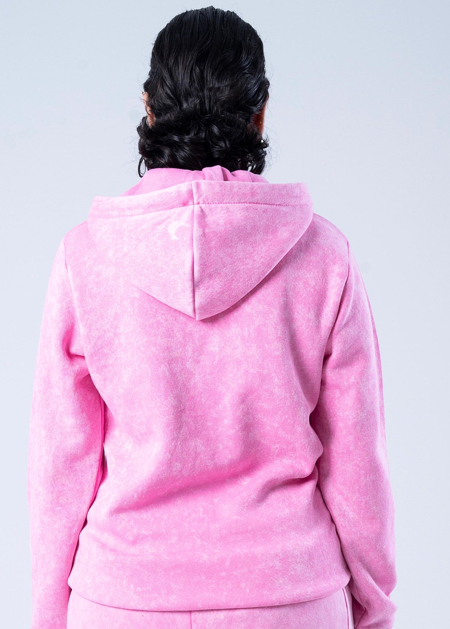 Men's pink fleece zip hoodie and sweatpants set, back view with hood