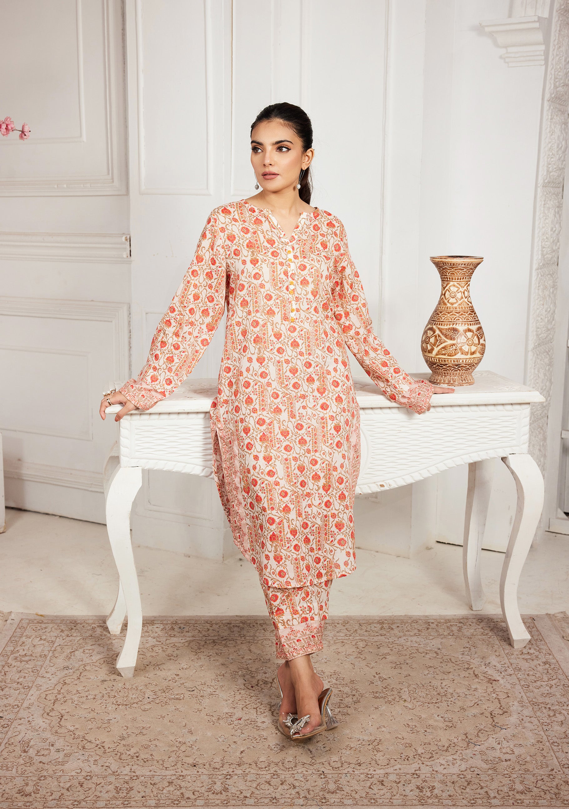 Orange patterned 2-piece suit with long tunic top and tapered matching pants