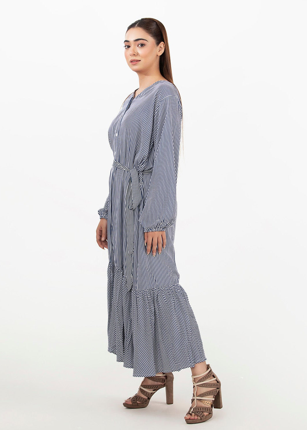 Women’s striped shirt dress in light blue, side view, button front and tiered hem
