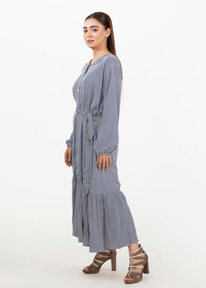 Women’s striped shirt dress in light blue, side view, button front and tiered hem