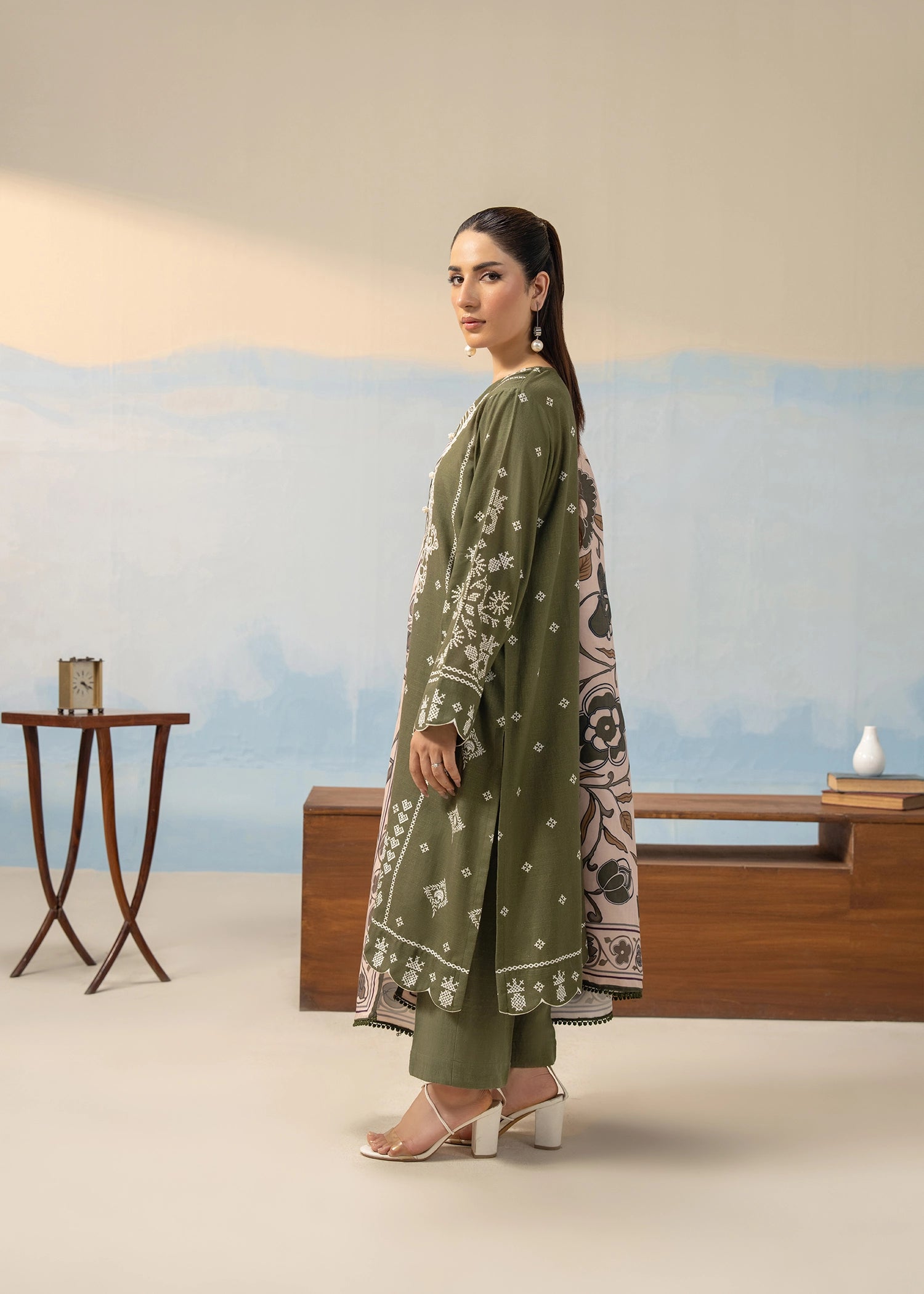 Olive green 3-piece women’s winter suit set with kurta, pants, and printed dupatta