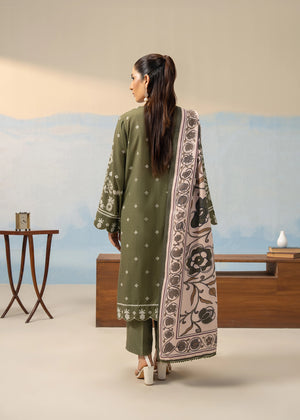 Olive green kurta suit set with ornate white embroidery and flowing printed dupatta