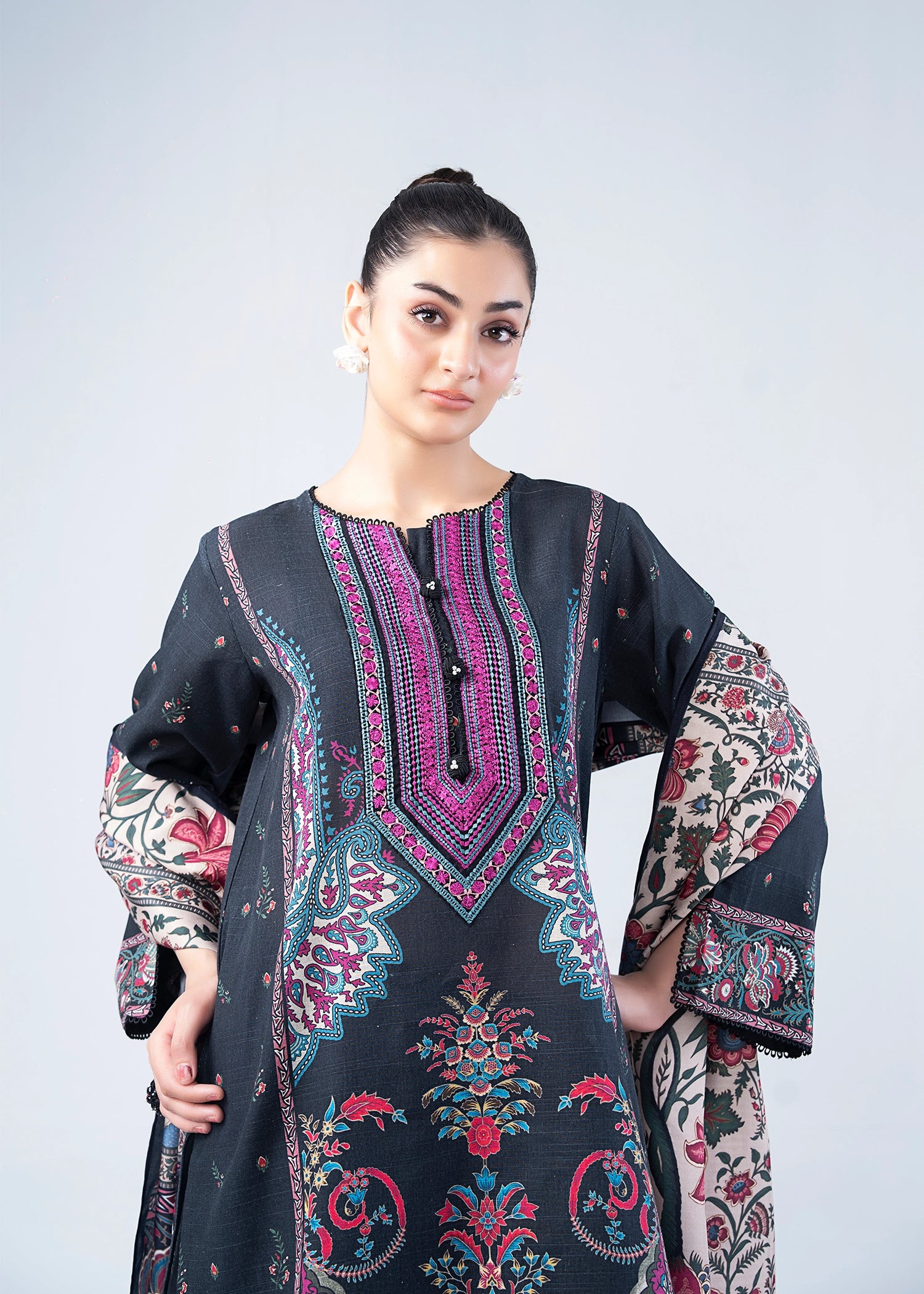 Women’s printed winter kurta with embroidered cuffs and side panel, dark pants
