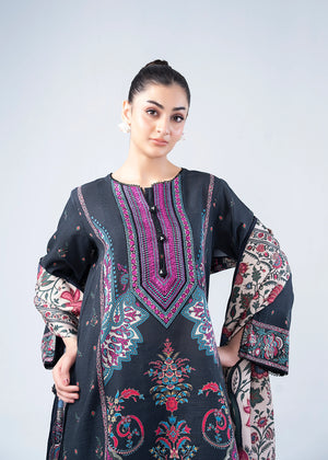 Women’s printed winter kurta with embroidered cuffs and side panel, dark pants