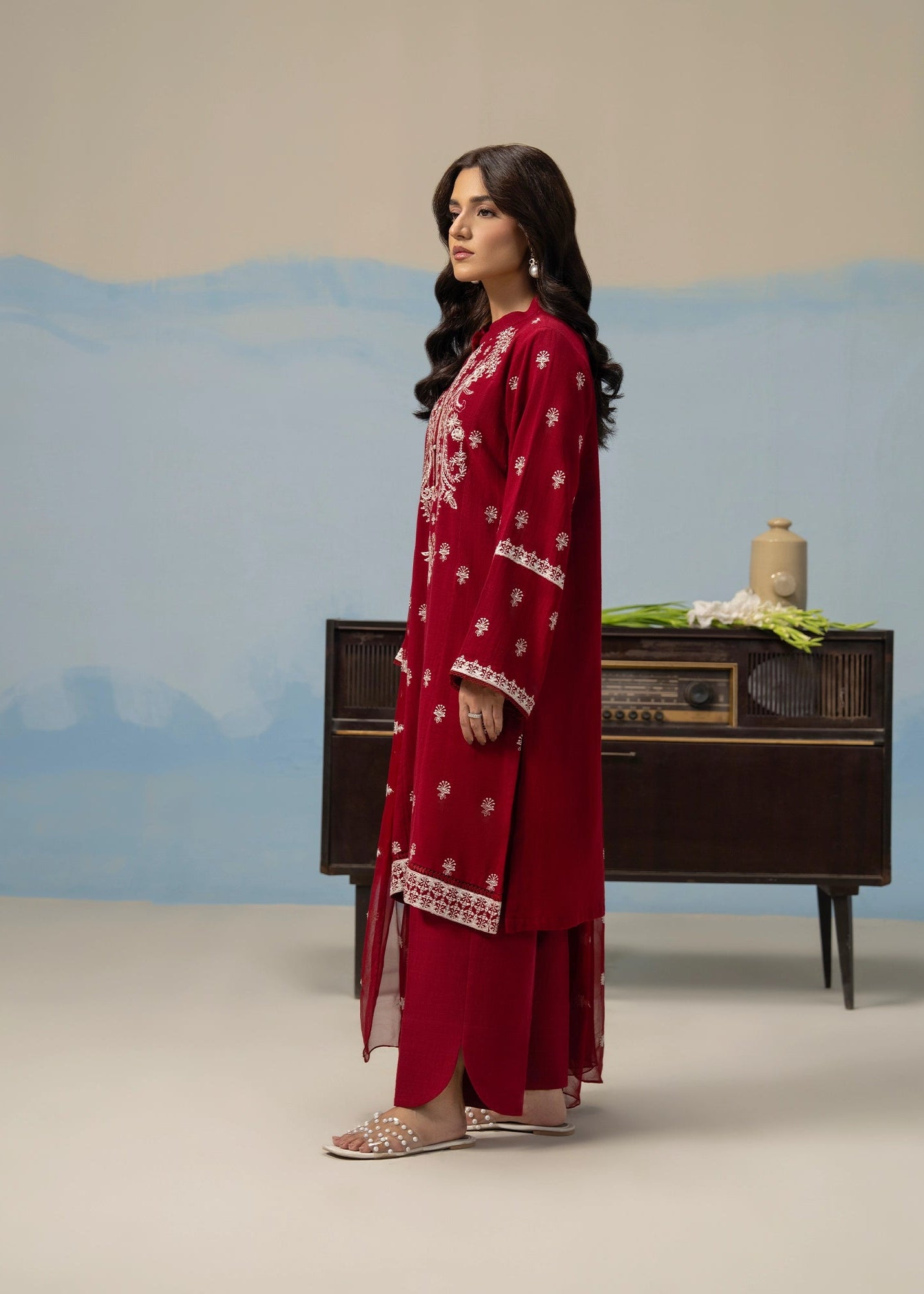 Maroon embroidered long kurta suit with matching pants and draped sheer dupatta