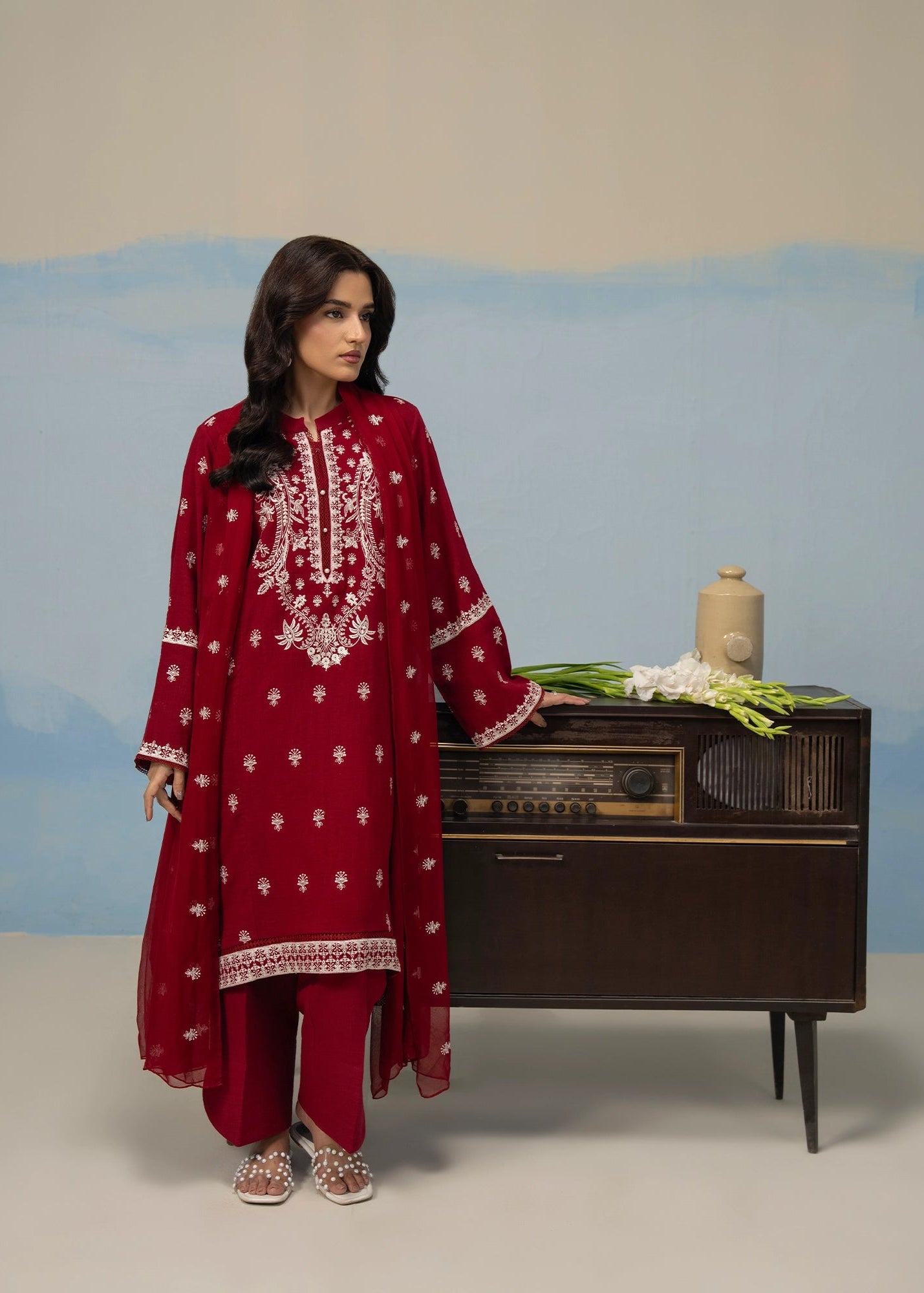 Maroon embroidered women’s suit set with long kurta, straight pants, and sheer dupatta