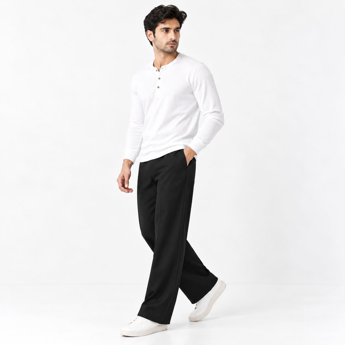 Men's black pull-on trousers, side view, relaxed straight legs
