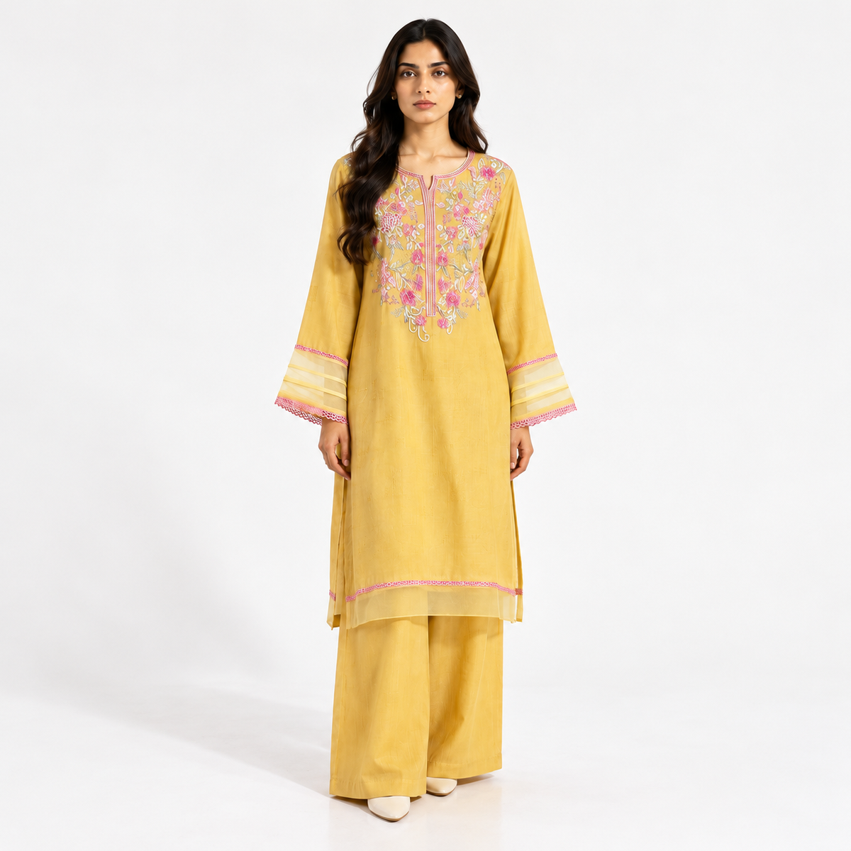 Mustard kurta and pant set with floral embroidery at yoke, round neckline, pink borders
