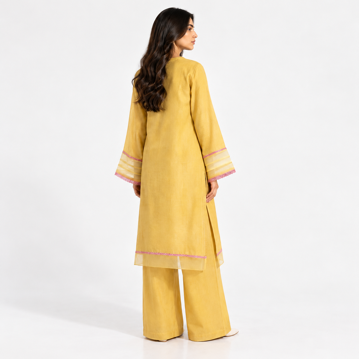 Mustard women's embroidered 2-piece suit with wide-leg pants and pink-trimmed sleeves