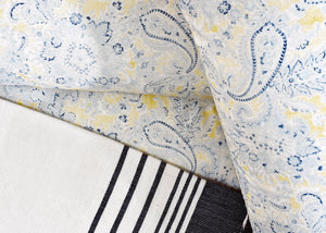 Cotton sateen duvet cover with blue paisley print and navy stripe trim