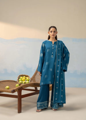 Women's blue embroidered 3-piece suit with long kurta, wide sleeves, and patterned pants