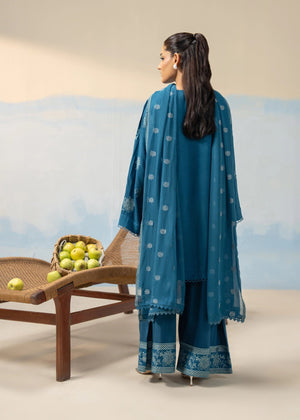 Women's blue embroidered 3-piece suit back view with lace-edged dupatta and floral motifs
