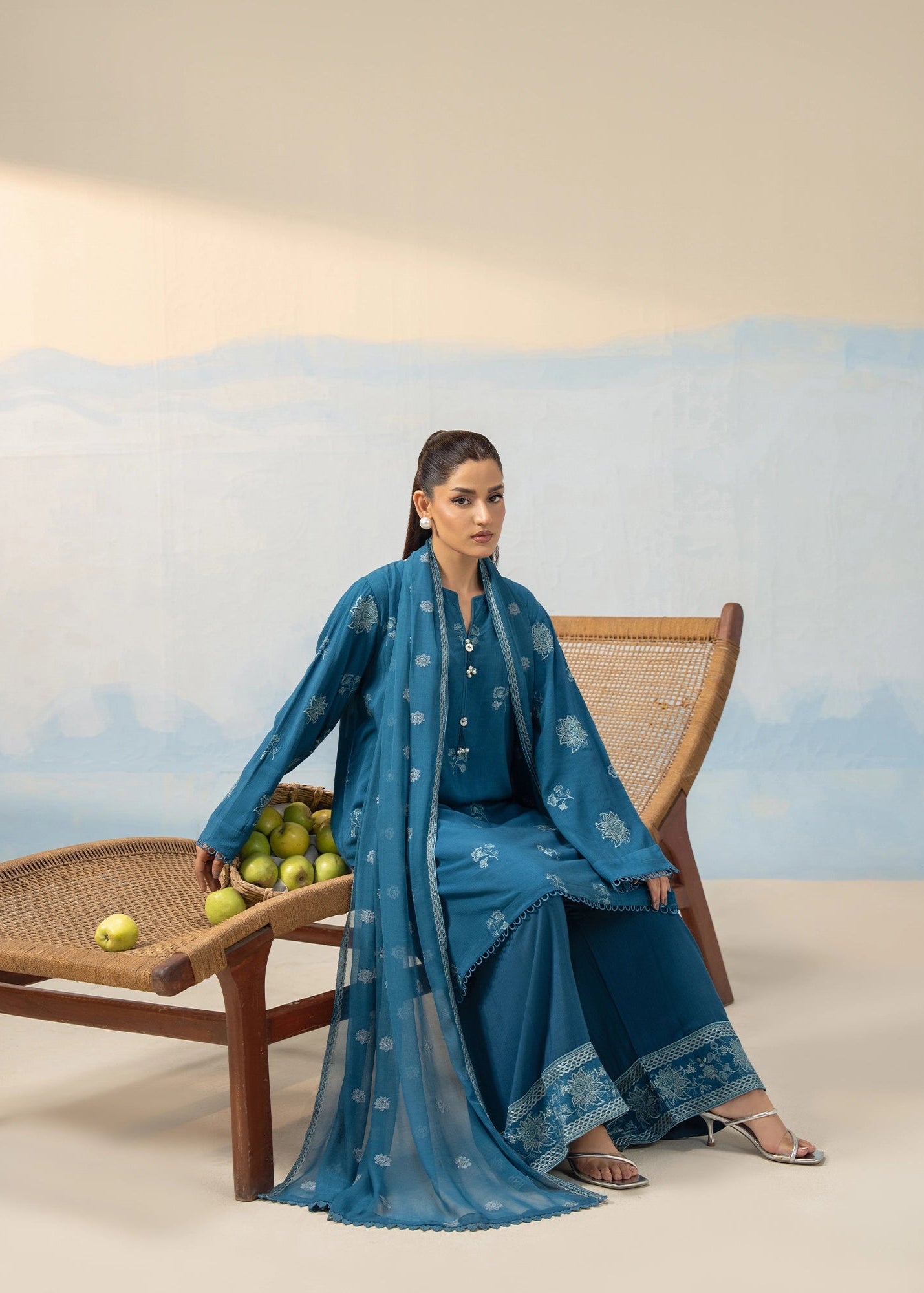 Women's blue embroidered 3-piece suit with flowing dupatta drape and matching patterned pants