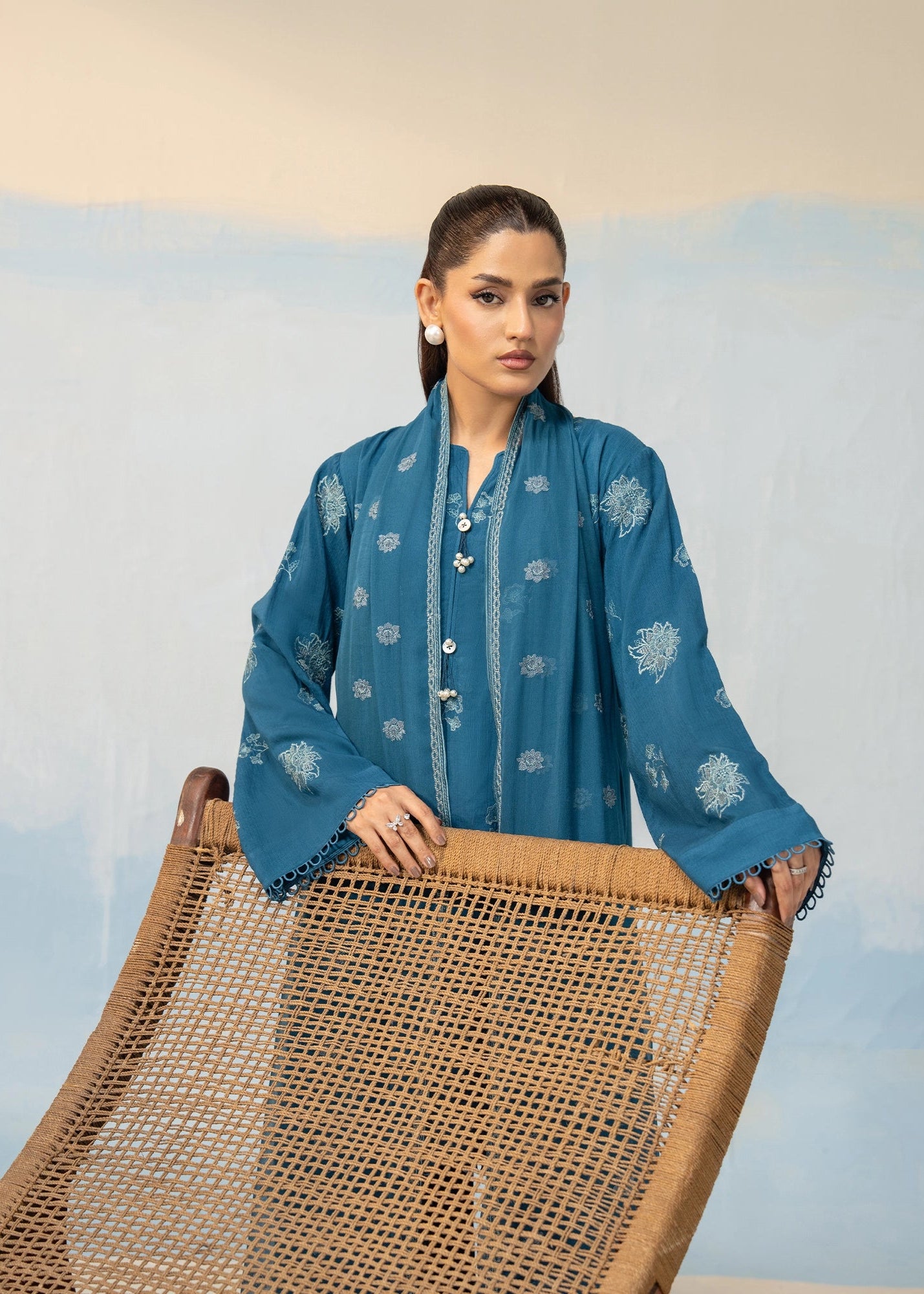 Women's blue embroidered 3-piece suit front view with button placket and lace trim