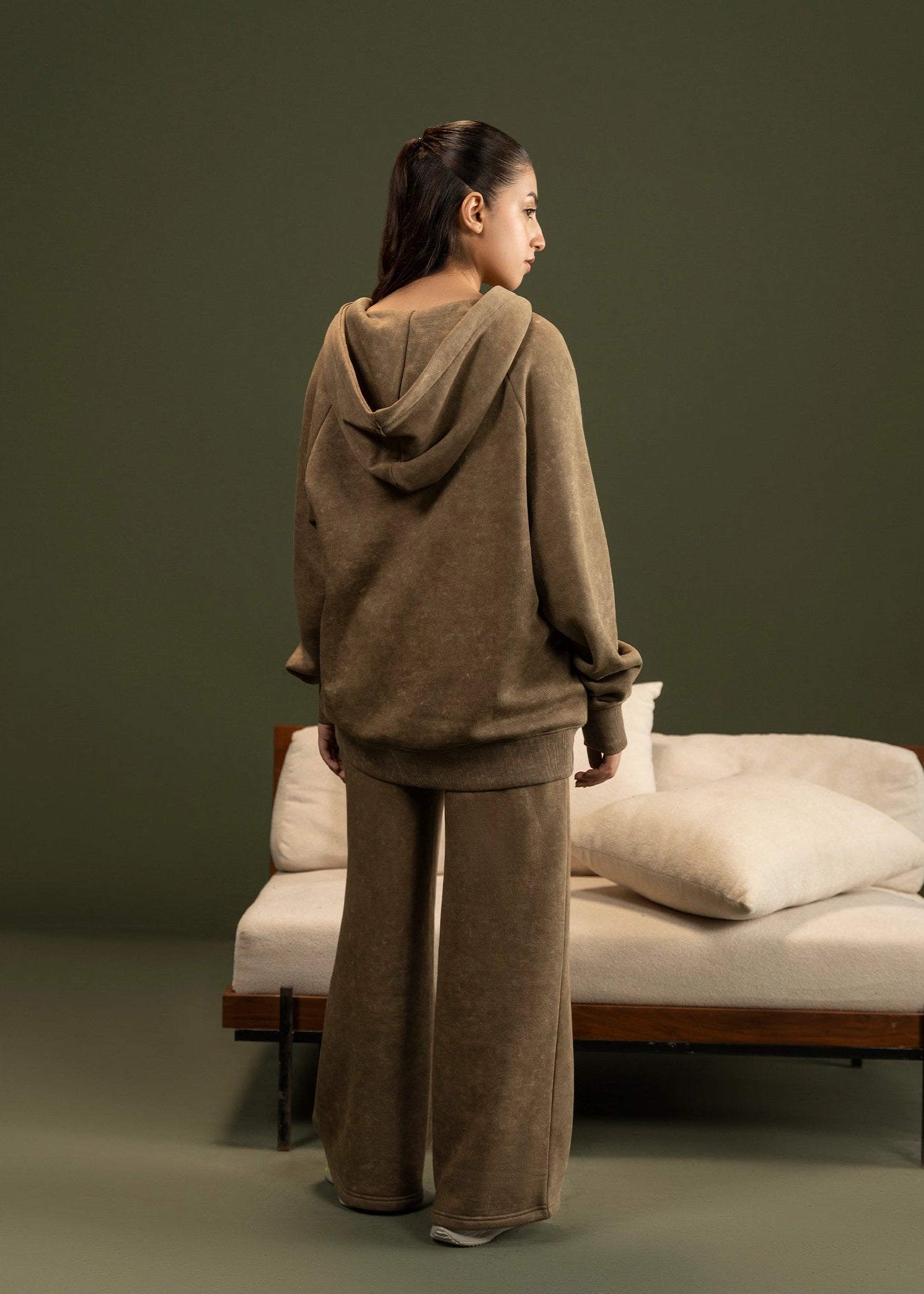 Men's brown terry casual trousers, back view with relaxed straight-leg silhouette.