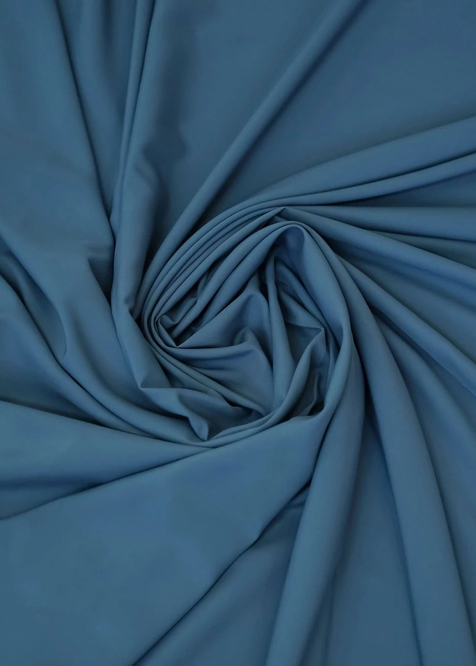 Cornet blue wash-and-wear fabric in gathered folds