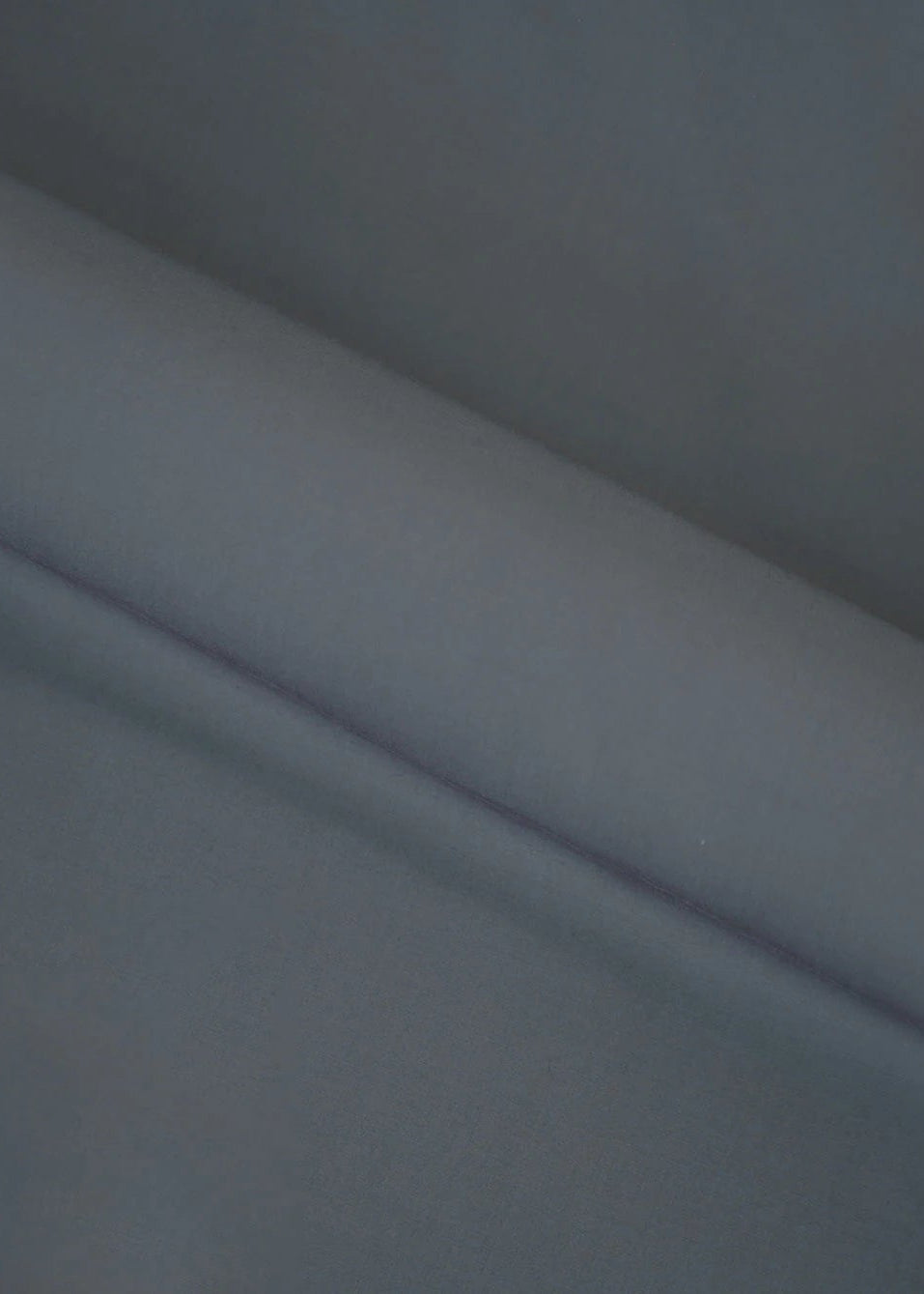 Women's winter grey wash-and-wear fabric in smooth, slightly draped close-up