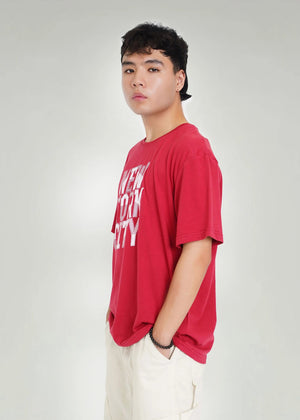 Maroon round-neck T-shirt side view with 'NEW YORK CITY' front print