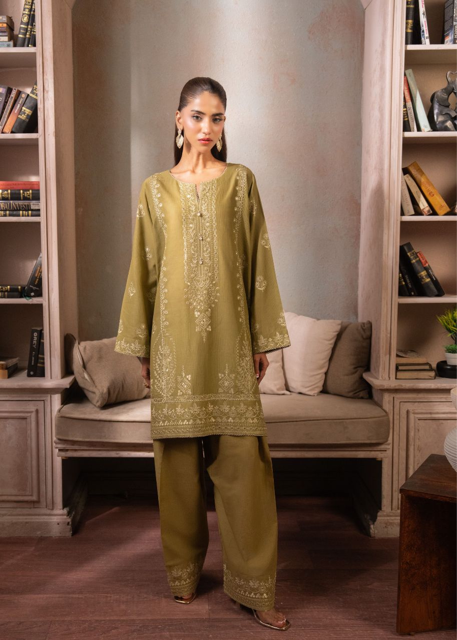 Olive green embroidered kurta set with decorative front yoke and matching straight-leg pants
