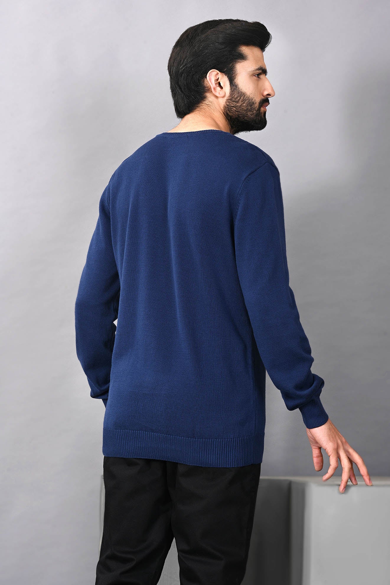Men's indigo V-neck sweater, long sleeves, ribbed hem, back view